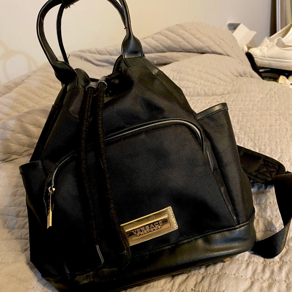 Versace Backpack/bucket bag with gold accents